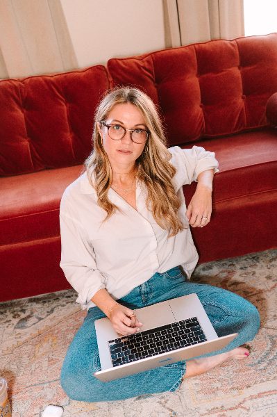 Katie Barnes working on a laptop